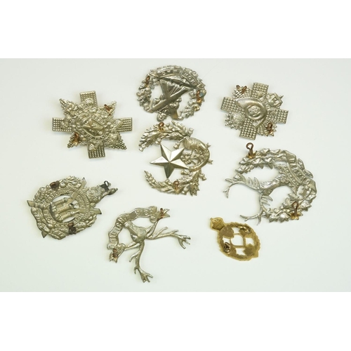 38 - A Small Collection Of Eight British Military Cap Badges To Include The Black Watch, The Royal Electr... 