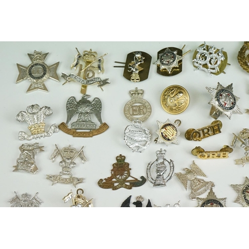 51 - A Large Collection Of Mainly British Military Regimental Cap Badges And Collar Badges To Include The... 