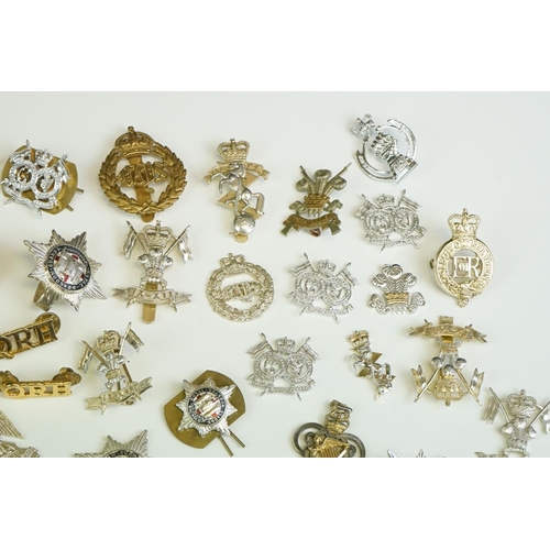 51 - A Large Collection Of Mainly British Military Regimental Cap Badges And Collar Badges To Include The... 