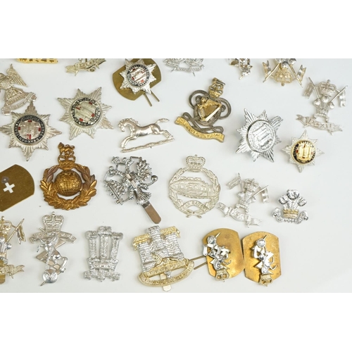 51 - A Large Collection Of Mainly British Military Regimental Cap Badges And Collar Badges To Include The... 