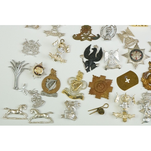 51 - A Large Collection Of Mainly British Military Regimental Cap Badges And Collar Badges To Include The... 