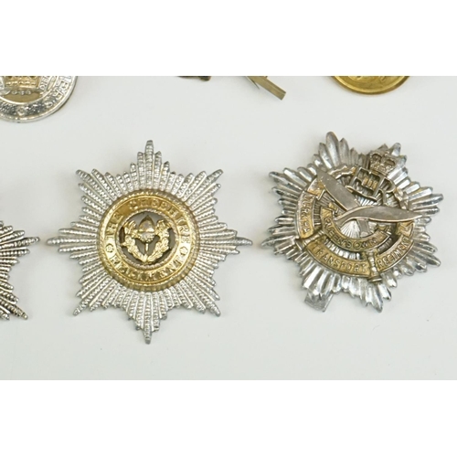 56 - A Small Collection Of Militaria To Include A Royal Monmouthshire Regiment Cap Badge, A Royal Electri... 