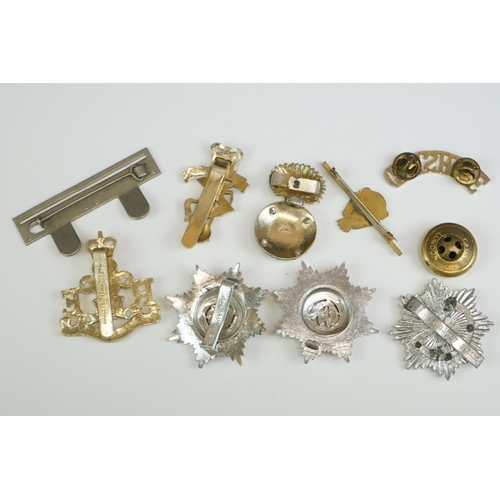 56 - A Small Collection Of Militaria To Include A Royal Monmouthshire Regiment Cap Badge, A Royal Electri... 