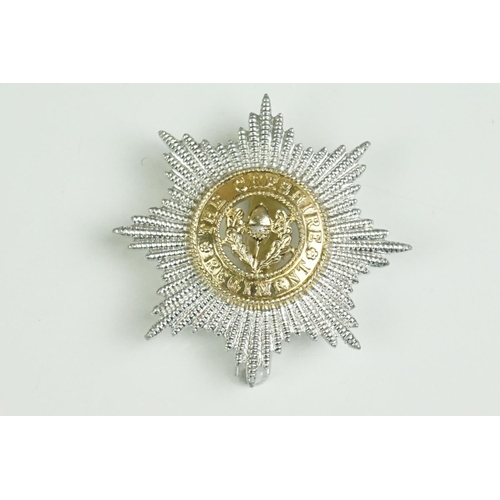 61 - A Collection Of Three British The Cheshire Regiment Cap Badges To Include A White Metal Two Piece Ex... 