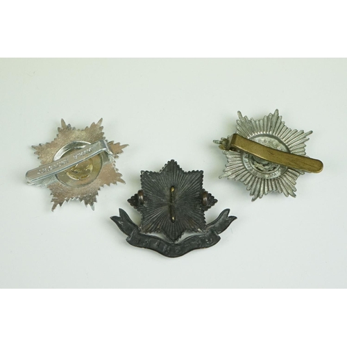 61 - A Collection Of Three British The Cheshire Regiment Cap Badges To Include A White Metal Two Piece Ex... 