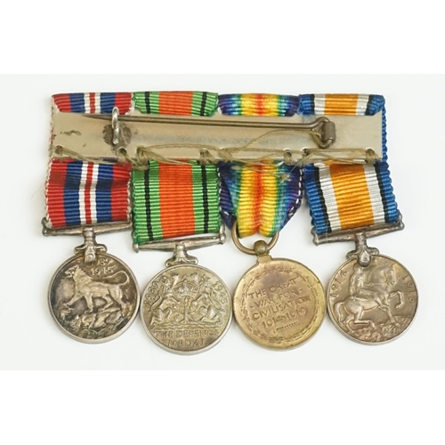 82 - A British World War One And World War Two Miniature Medal Group To Include The 1914-1918 British War... 