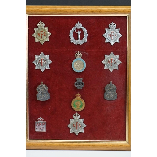 86 - A Collection Of Framed British World War Two Badges To Include National Fire Service, Auxiliary Fire... 