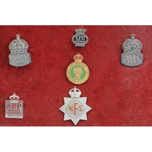 86 - A Collection Of Framed British World War Two Badges To Include National Fire Service, Auxiliary Fire... 