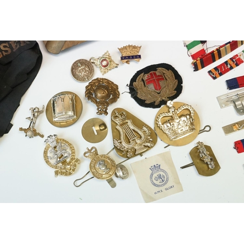 137 - A Collection Of Mixed Militaria To Include Cap Badges, Medal Ribbons & Bars, Navy Cap Tally's, Badge... 