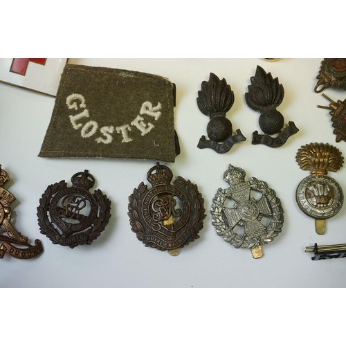 122 - A Collection Of British Military Collectables To Include Cap Badges, Regimental Buttons, Dog Tags An... 