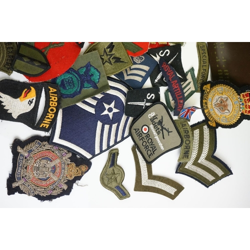 148 - A Collection Of Military Cloth Badges To Include Trade Badges, Stripes...etc.. Contained Within A Mi... 