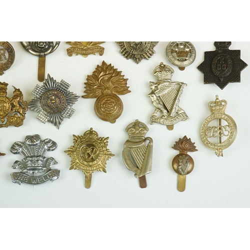 165 - A Collection Of Approx Thirty Military Cap Badges To Include The Wiltshire Regiment, The Royal Armou... 