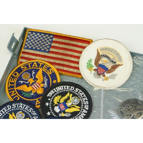 216 - A Collection Of United States Of America Military Collectables To Include Cap Badges, Cloth Badges A... 