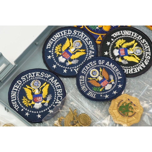 216 - A Collection Of United States Of America Military Collectables To Include Cap Badges, Cloth Badges A... 