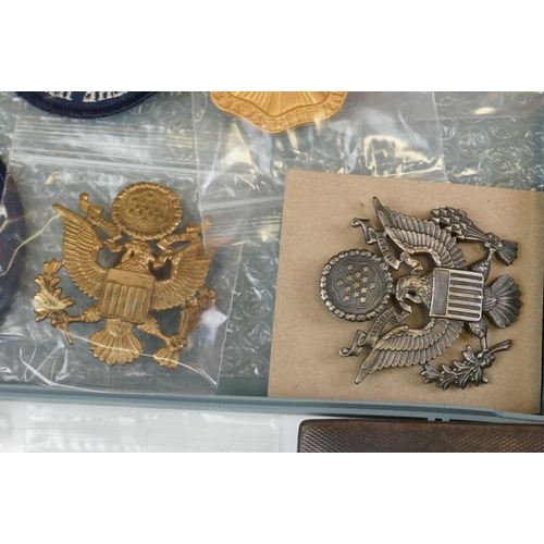 216 - A Collection Of United States Of America Military Collectables To Include Cap Badges, Cloth Badges A... 