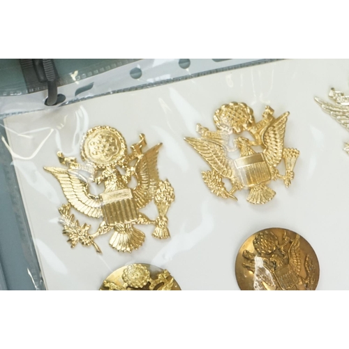 216 - A Collection Of United States Of America Military Collectables To Include Cap Badges, Cloth Badges A... 