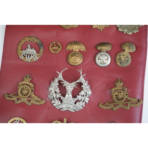 217 - A Collection Of Approx Twenty Four Military Badges To Include British Military Regimental Cap Badges... 