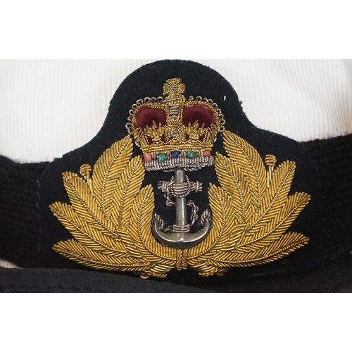 229 - A Mixed Collection Of Militaria To Include A British Royal Navy Female Officers Cap, Two Male Navy C... 