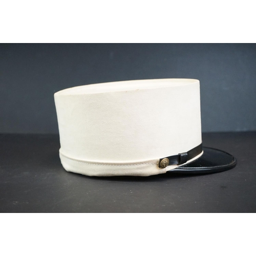 210A - A French Foreign Legion Kepi Hat With Neck Flap And Brass Anchor Buttons.