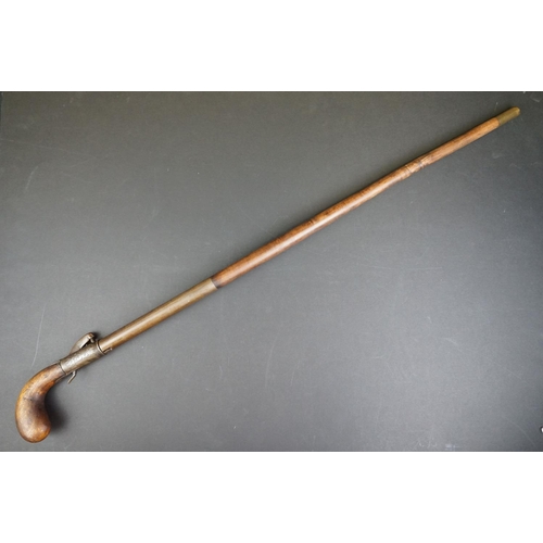 370 - An Antique Percussion Cap Walking Stick Pistol With Decorative Engraving And Indistinct Maker Mark.