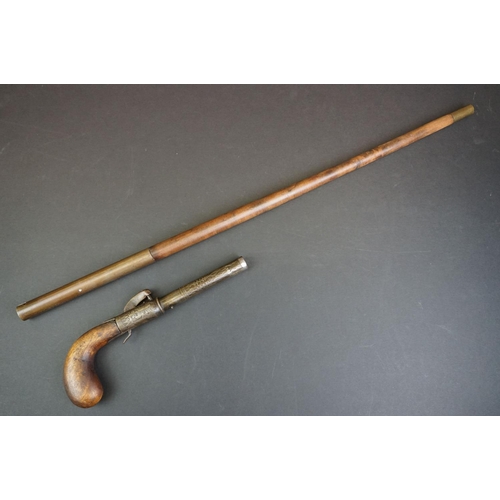 370 - An Antique Percussion Cap Walking Stick Pistol With Decorative Engraving And Indistinct Maker Mark.