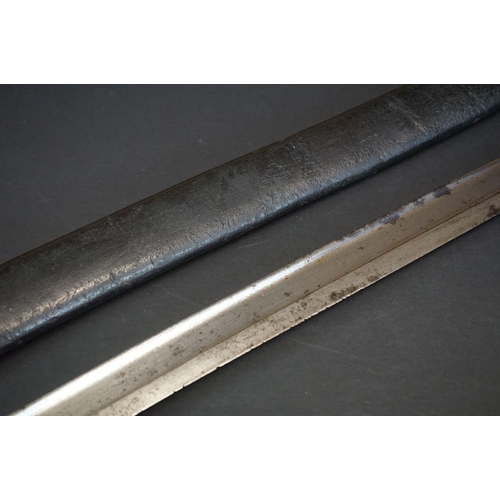 371 - A Pre World War One Sword Bayonet With Brass Handle And Hooked Quillion, Complete With Original Scab... 