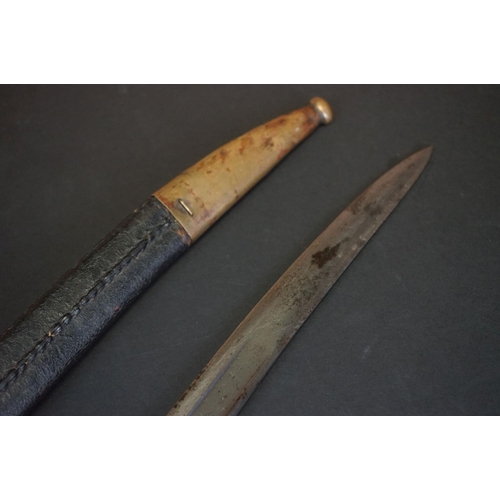 371 - A Pre World War One Sword Bayonet With Brass Handle And Hooked Quillion, Complete With Original Scab... 