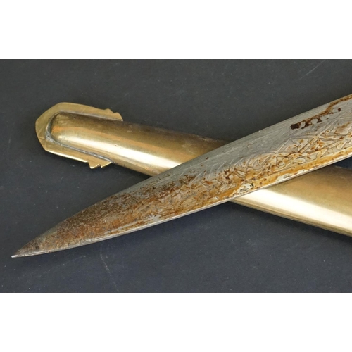 373 - Two Islamic Daggers With Decoratively Engraved Blades, Horn / Bone Handles And Brass Scabbards.