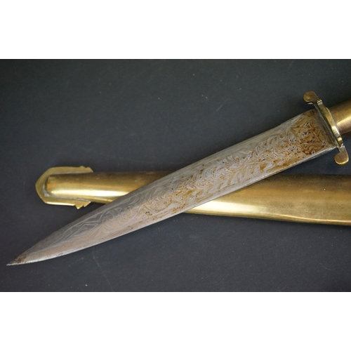 373 - Two Islamic Daggers With Decoratively Engraved Blades, Horn / Bone Handles And Brass Scabbards.