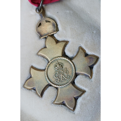 136 - A British World War One & World War Two Family Medal Group To Include Two Military Cross Medals. The... 