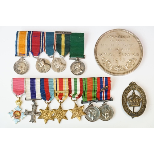 136 - A British World War One & World War Two Family Medal Group To Include Two Military Cross Medals. The... 