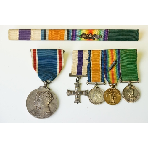 136 - A British World War One & World War Two Family Medal Group To Include Two Military Cross Medals. The... 