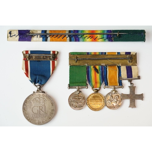 136 - A British World War One & World War Two Family Medal Group To Include Two Military Cross Medals. The... 