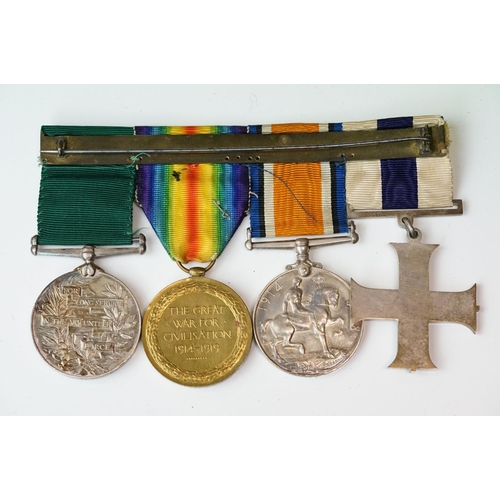 136 - A British World War One & World War Two Family Medal Group To Include Two Military Cross Medals. The... 