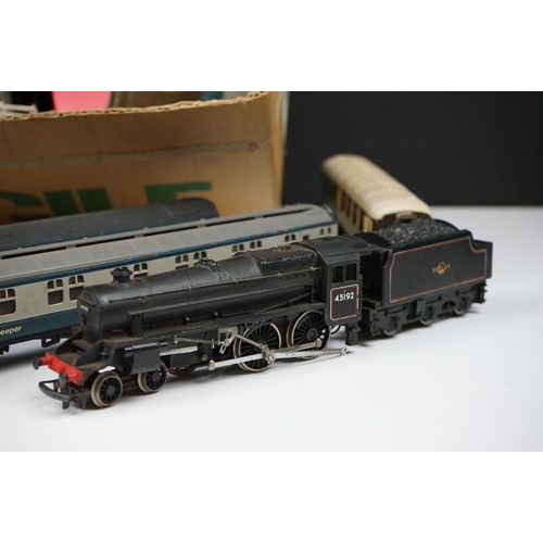 109 - Quantity of OO gauge model railway to include 2 x locomotives, rolling stock featuring coaches and w... 