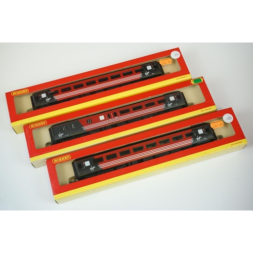 71 - Nine boxed Hornby OO gauge items of rolling stock to include 2 x R4086C, R4087B, R4451, R4143, R4146... 