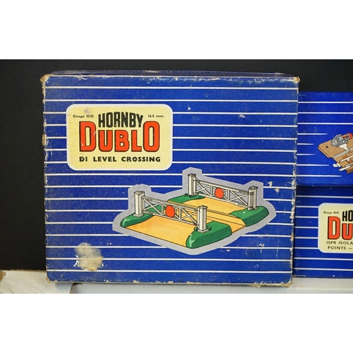 83 - Quantity of boxed Hornby Dublo model railway to include 10 x items of rolling stock, various track, ... 