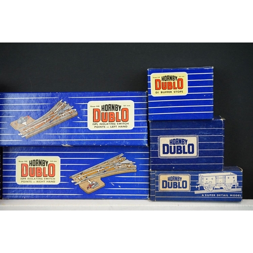 83 - Quantity of boxed Hornby Dublo model railway to include 10 x items of rolling stock, various track, ... 