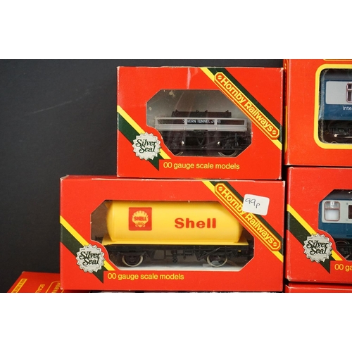 88 - 15 Boxed OO gauge items of rolling stock to include 13 x Hornby and 2 x Wrenn, features coaches, wag... 