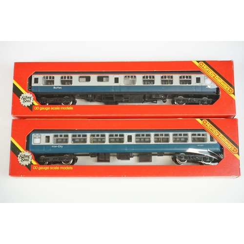 88 - 15 Boxed OO gauge items of rolling stock to include 13 x Hornby and 2 x Wrenn, features coaches, wag... 