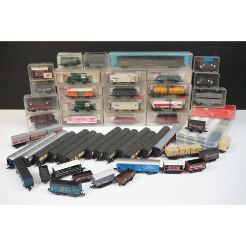 96 - Over 55 cased and uncased N gauge items of rolling stock to include Peco, Fleischmann, Trix etc, fea... 