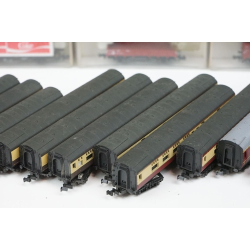 96 - Over 55 cased and uncased N gauge items of rolling stock to include Peco, Fleischmann, Trix etc, fea... 