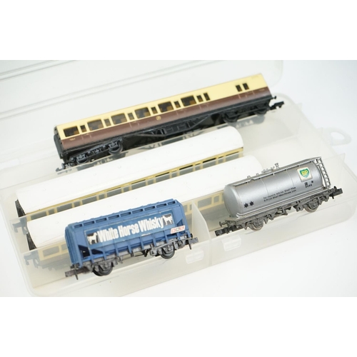 96 - Over 55 cased and uncased N gauge items of rolling stock to include Peco, Fleischmann, Trix etc, fea... 