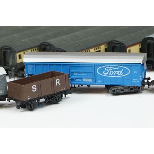 96 - Over 55 cased and uncased N gauge items of rolling stock to include Peco, Fleischmann, Trix etc, fea... 