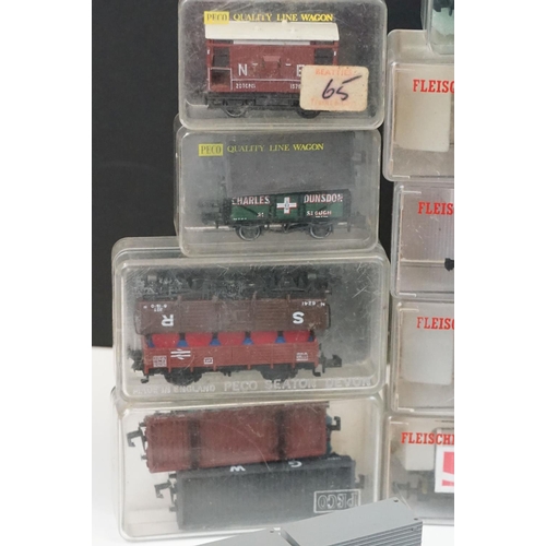 96 - Over 55 cased and uncased N gauge items of rolling stock to include Peco, Fleischmann, Trix etc, fea... 