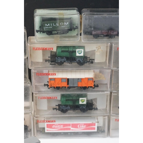 96 - Over 55 cased and uncased N gauge items of rolling stock to include Peco, Fleischmann, Trix etc, fea... 