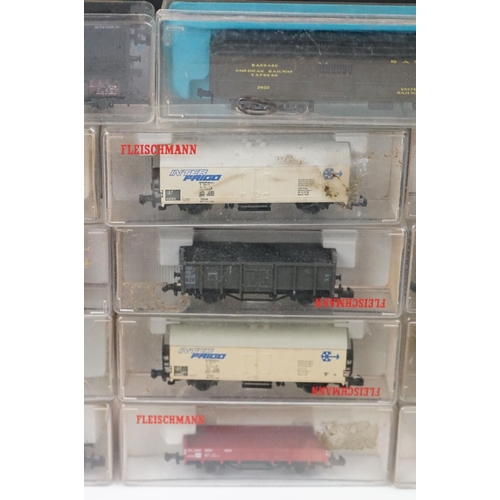 96 - Over 55 cased and uncased N gauge items of rolling stock to include Peco, Fleischmann, Trix etc, fea... 