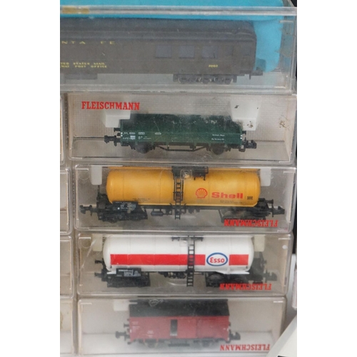 96 - Over 55 cased and uncased N gauge items of rolling stock to include Peco, Fleischmann, Trix etc, fea... 