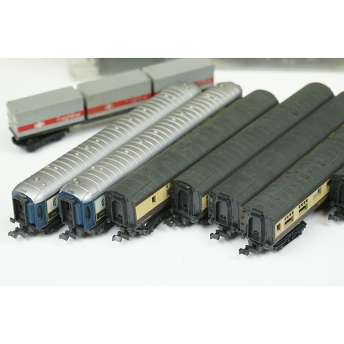 96 - Over 55 cased and uncased N gauge items of rolling stock to include Peco, Fleischmann, Trix etc, fea... 