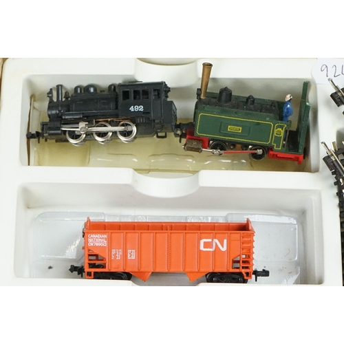 97 - Collection of N gauge model railway to include 2 x locomotives featuring Jouef Steatite, 7 x items o... 